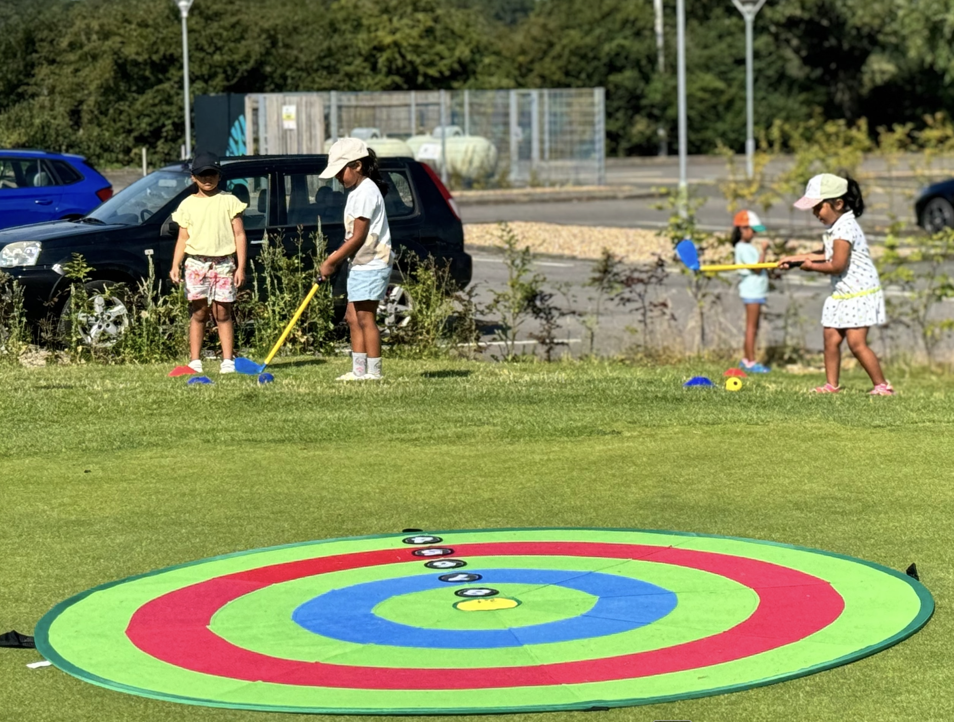 Children at the target putting game